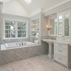 Master bathroom with marble and custom trim.